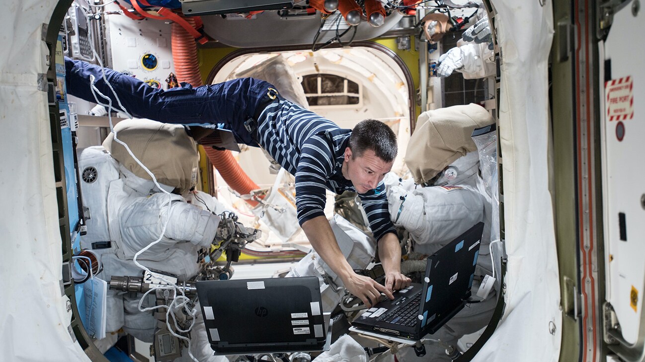 AMONG THE STARS - NASA astronaut Andrew Morgan reviews procedures the day before the EVA that took place on Oct. 6 to upgrade the space station’s batteries. (NASA)  ANDREW MORGAN