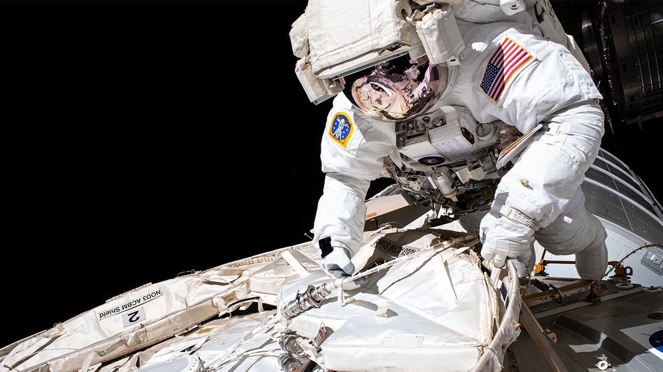 AMONG THE STARS - (July 21, 2020) - NASA astronaut and Expedition 63 Commander Chris Cassidy conducts a spacewalk to set up the Tranquility module for the future installation of a NanoRacks airlock that will enable public and commercial research on the outside of the International Space Station. Cassidy has completed 10 spacewalks throughout his career for a total of 54 hours and 51 minutes spacewalking time. (NASA)  CHRIS CASSIDY