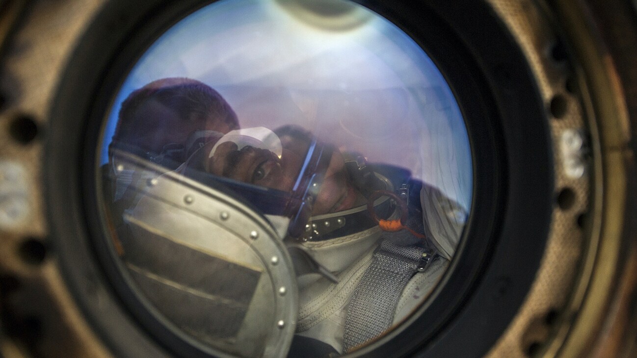 AMONG THE STARS - Expedition 63 NASA astronaut Chris Cassidy smiles from inside the Soyuz MS-16 spacecraft just minutes after he and Roscosmos cosmonauts Ivan Vagner, and Anatoly Ivanishin, landed in a remote area near the town of Zhezkazgan, Kazakhstan on Thursday, October 22, 2020, Kazakh time (Oct. 21 Eastern time). Cassidy, Ivanishin and Vagner returned after 196 days in space having served as Expedition 62-63 crew members onboard the International Space Station. (NASA/GCTC/Denis Derevtsov) CHRIS CASSIDY