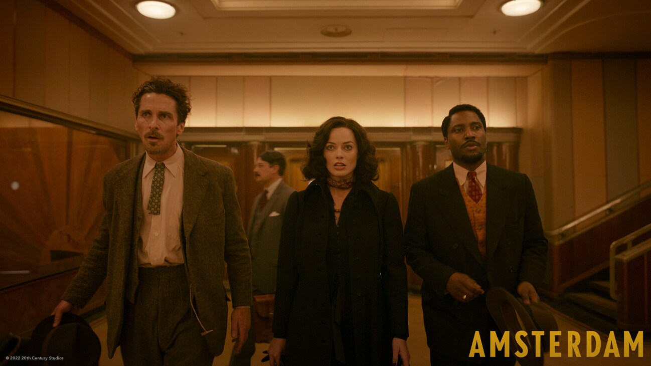 Actors Christian Bale, Margot Robbie, and John David Washington from the 20th Century Studios movie, "Amsterdam", in theaters November 4, 2022.