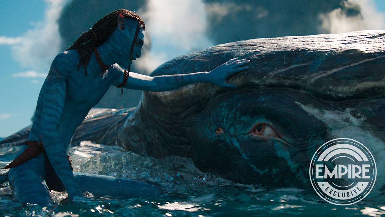 Image of a character with a large sea creature from the 20th Century Studios movie Avatar: The Way of Water.