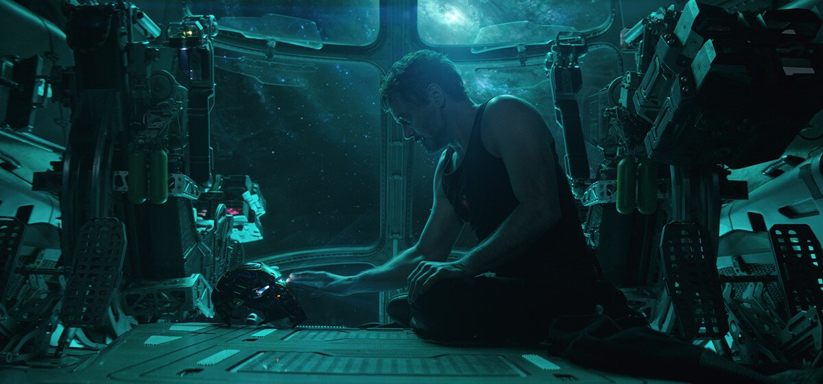 Robert Downey Jr., who plays Iron Man/Tony Stark in Avengers: Endgame, touching his Iron Man mask while in outer space