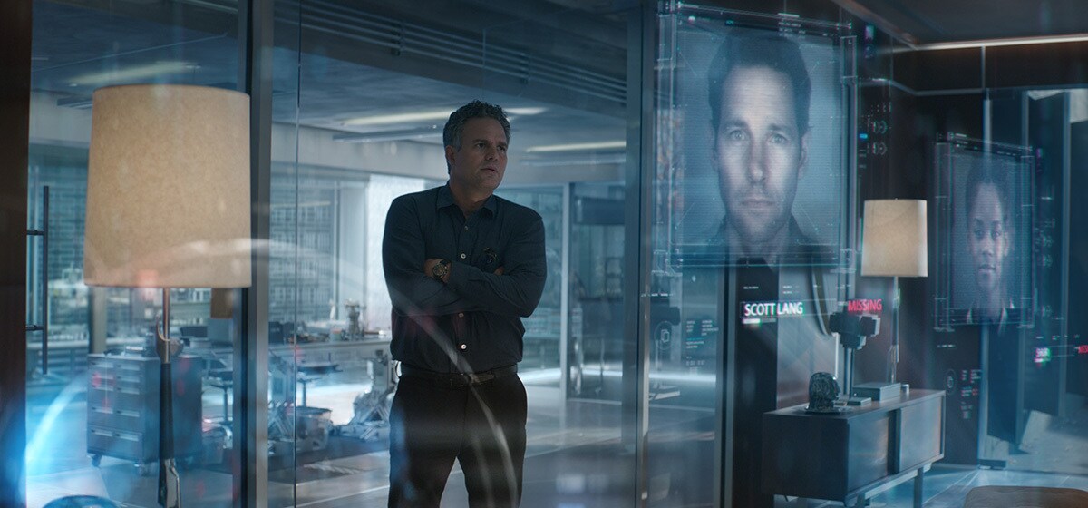 Mark Ruffalo, who plays Bruce Banner/The Hulk in Avengers: Endgame, in Avengers Headquarters looking at an image of Paul Rudd, who plays Ant-Man