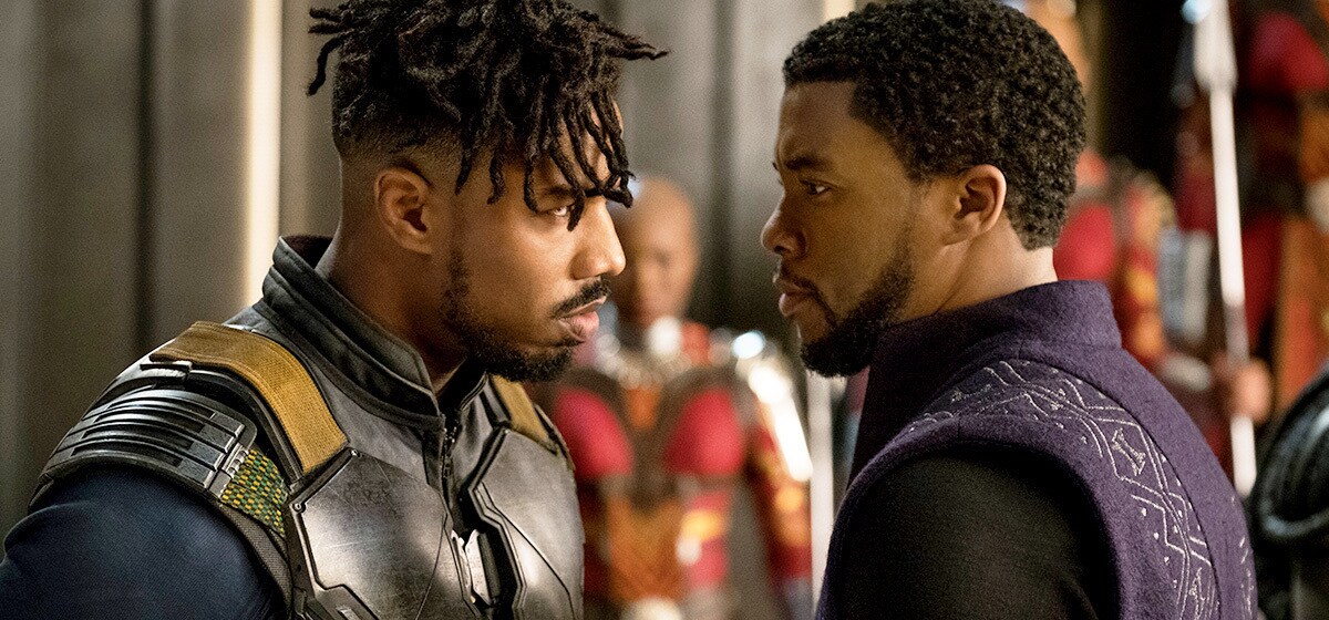 Michael B. Jordan as Killmonger and Chadwick Boseman as T'challa from the film "Black Panther"