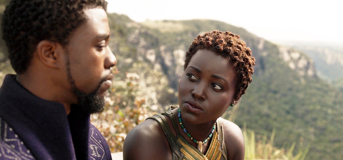 Lupita Nyong’o as Nakia talking to Chadwick Bosman (as T'Challa)