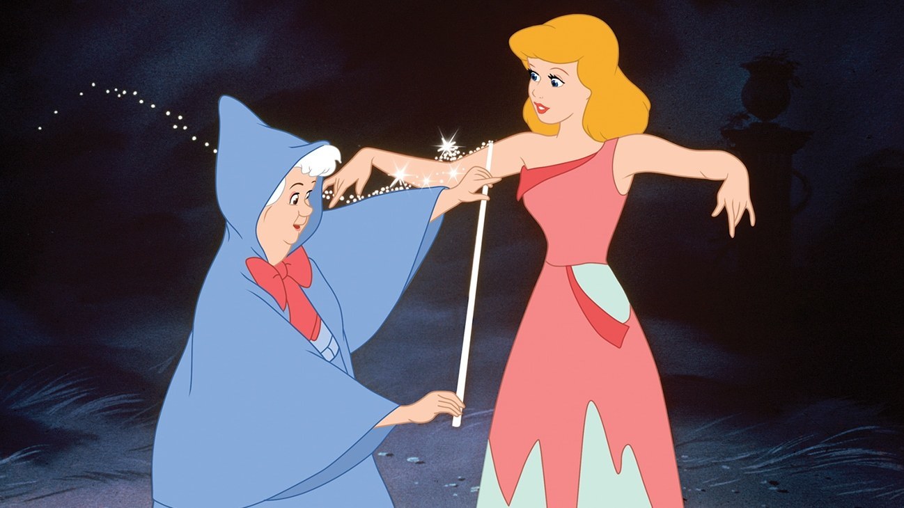 Fairy Godmother preparing to give Cinderella a new dress so she can go to the ball.
