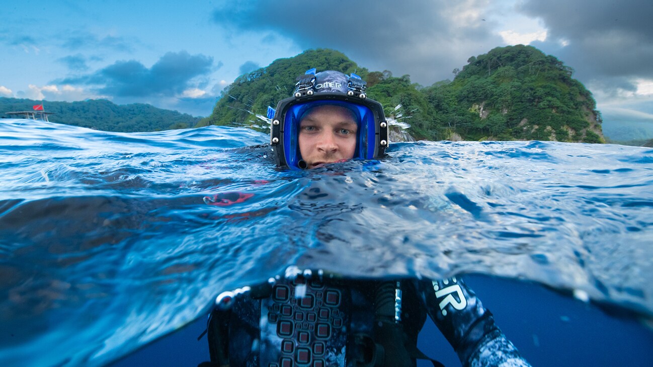 Bertie Gregory at the water's surface. (Credit: National Geographic/Hugh Pearson for Disney+)