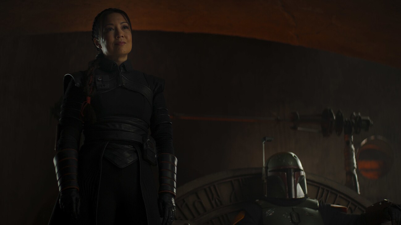 (L-R): Fennec Shand (Ming-Na Wen) and Boba Fett (Temura Morrison) in Lucasfilm's THE BOOK OF BOBA FETT, exclusively on Disney+. © 2021 Lucasfilm Ltd. & ™. All Rights Reserved.