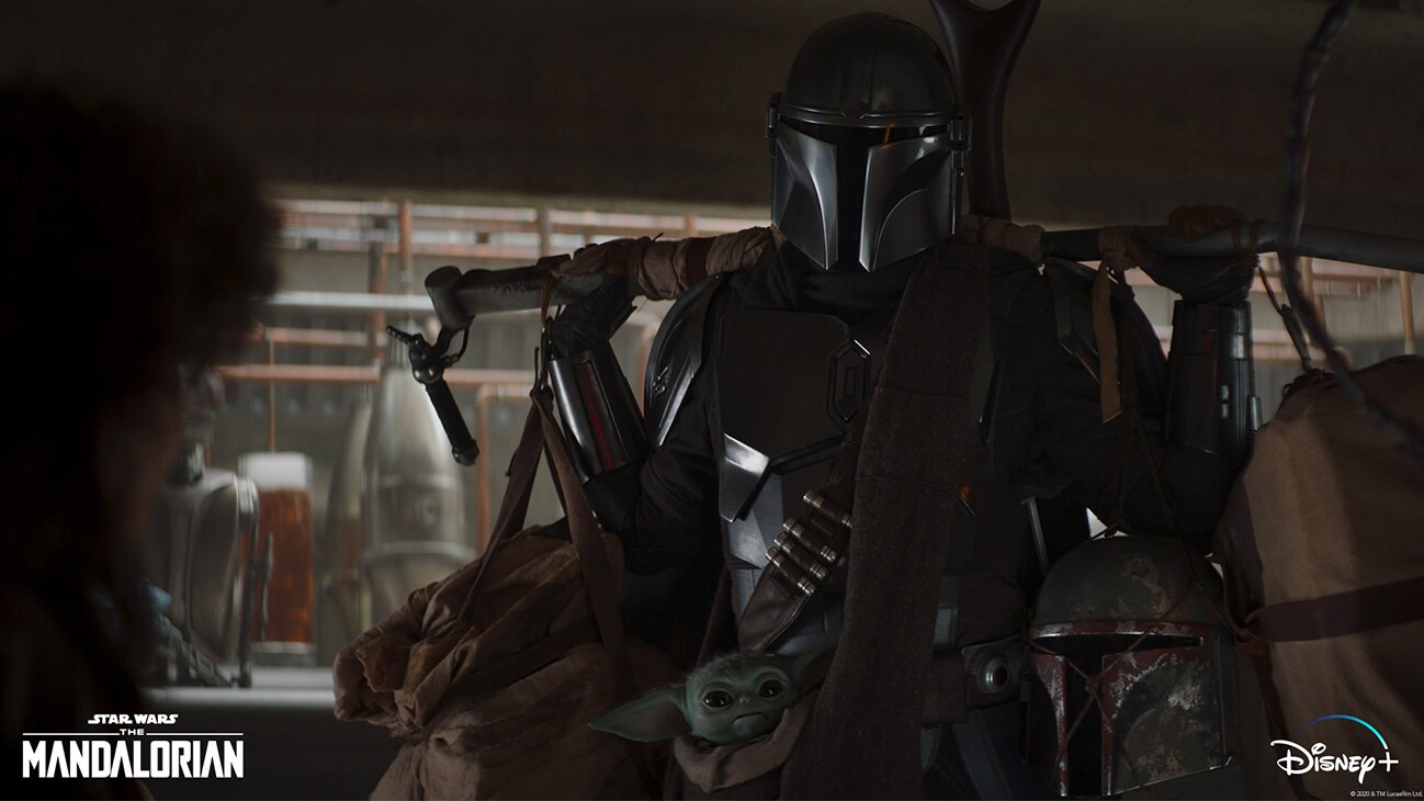 (L-R): Peli Motto (Amy Sedaris), the Mandalorian (Pedro Pascal) and The Child in Lucasfilm's THE MANDALORIAN, season two, exclusively on Disney+. © 2020 Lucasfilm Ltd. & ™. All Rights Reserved.