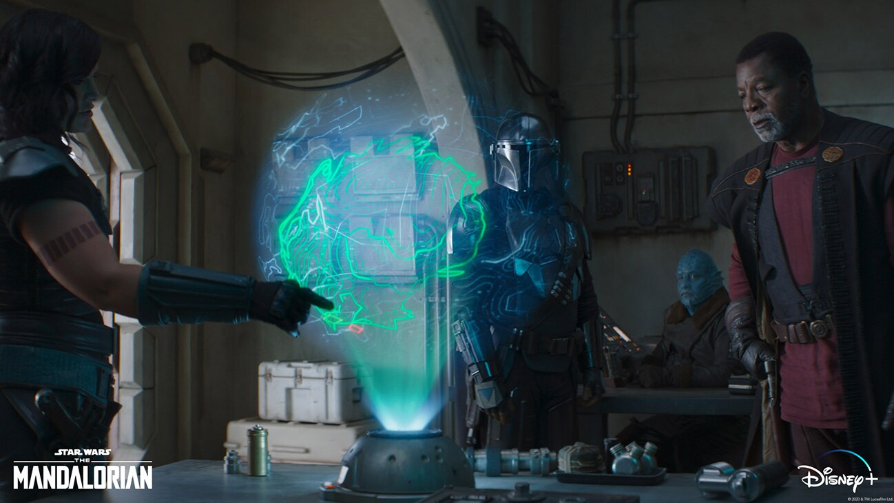 (L-R): Cara Dune (Gina Carano), The Mandalorian (Pedro Pascal), Mythrol (Horatio Sanz) and Greef Karga (Carl Weathers) in Lucasfilm's THE MANDALORIAN, season two, exclusively on Disney+. © 2020 Lucasfilm Ltd. & ™. All Rights Reserved.