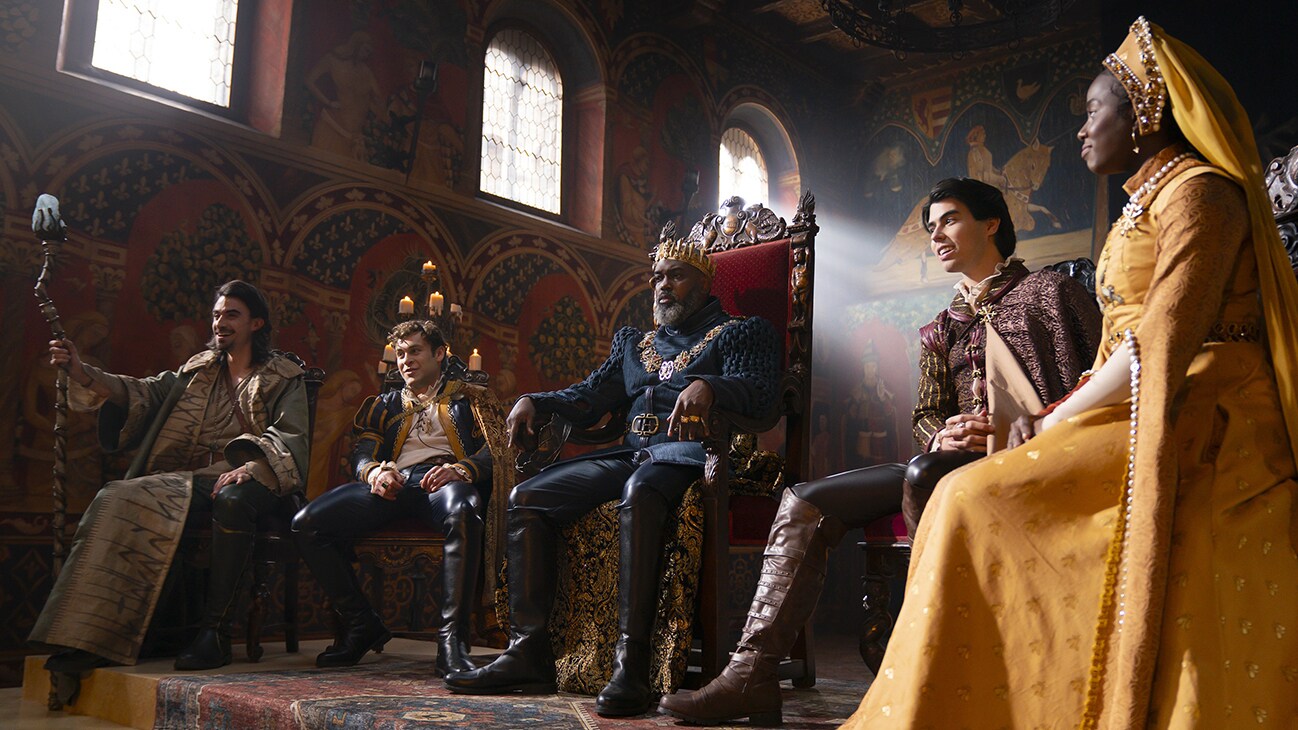 Dravus, Prince Cedric, King Silas, Prince Emmett, and Princess Adaline await to hear from the heroes summoned by the fates. (Disney/Allyson Riggs)