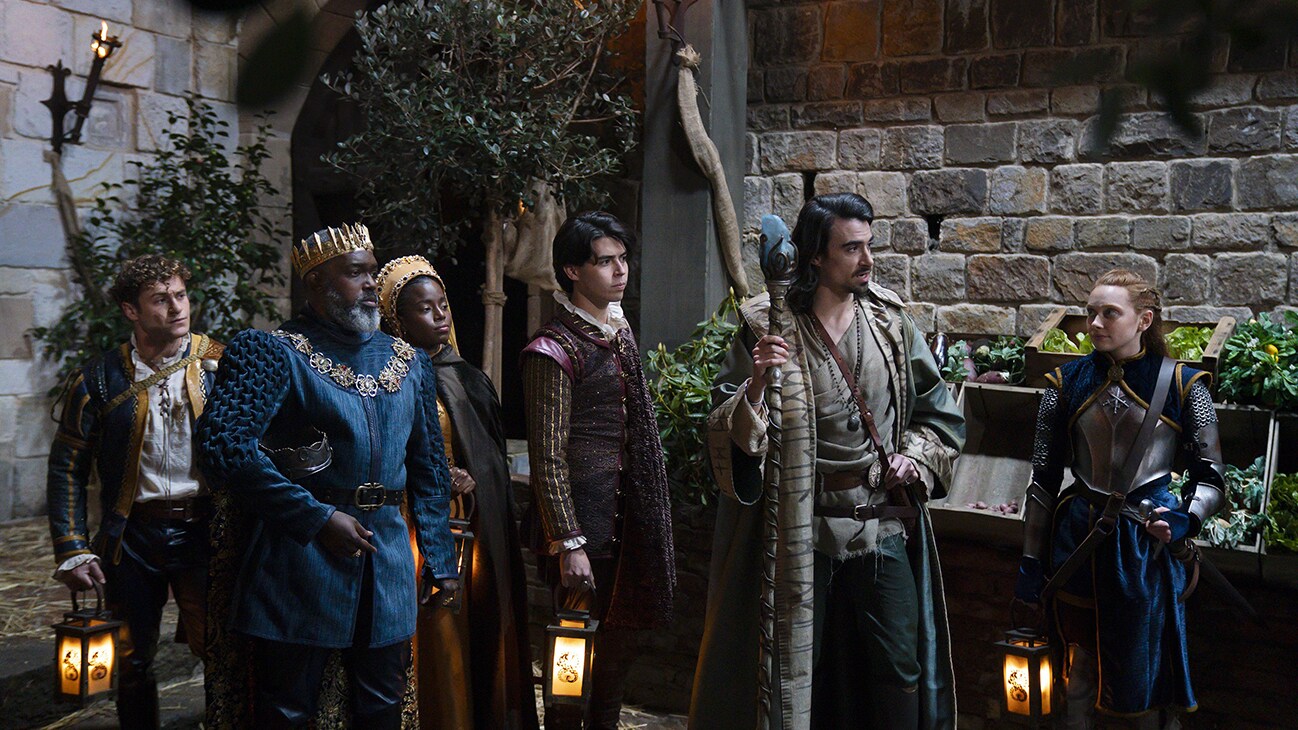 King Silas, Dravus, and the heirs of Sanctum, take the outsiders summoned to fates. (Disney/Allyson Riggs)