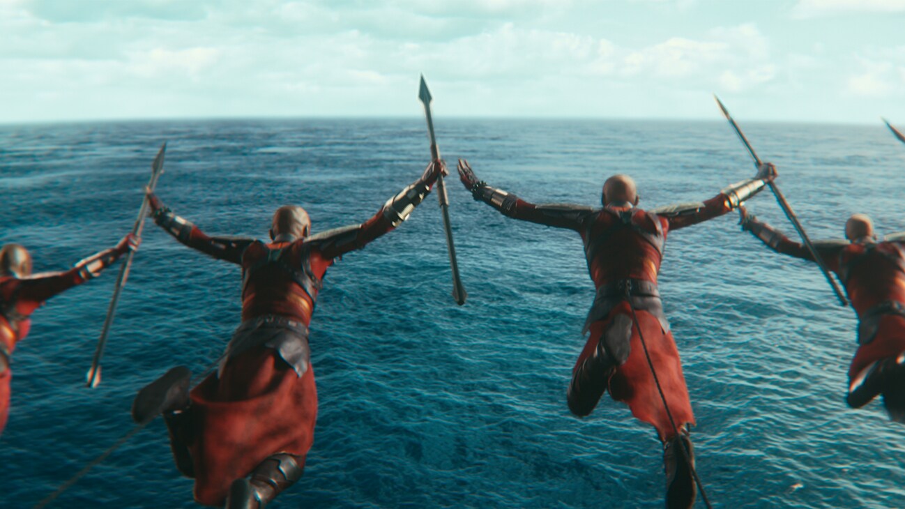 The Dora Milaje jump into the sea. From the film, Marvel Studios' Black Panther: Wakanda Forever.