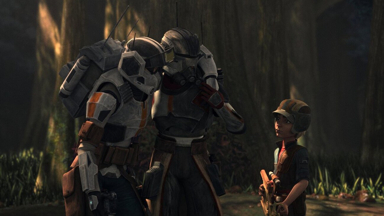 Two clone troopers and a young boy from the Disney+ Original series, "Star Wars: The Bad Batch Season 2."
