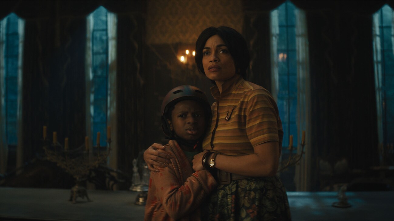haunted mansion movie duration (L-R): Chase Dillon as Travis and Rosario Dawson as Gabbie in Disney's live-action HAUNTED MANSION. Photo courtesy of Disney. © 2023 Disney Enterprises, Inc. All Rights Reserved.