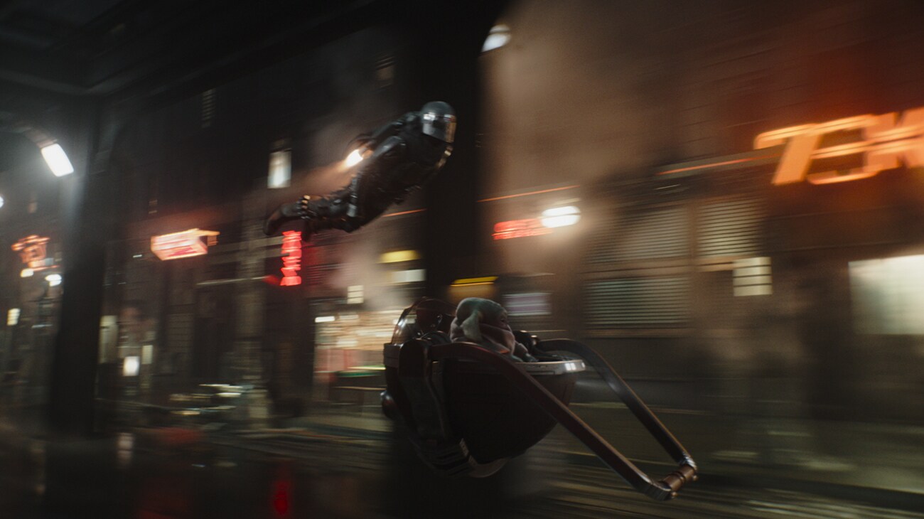 (L-R) The Mandalorian (Pedro Pascal) and Grogu in Lucasfilm's THE MANDALORIAN AND GROGU. Photo courtesy of Lucasfilm. © 2026 Lucasfilm Ltd™. All Rights Reserved.