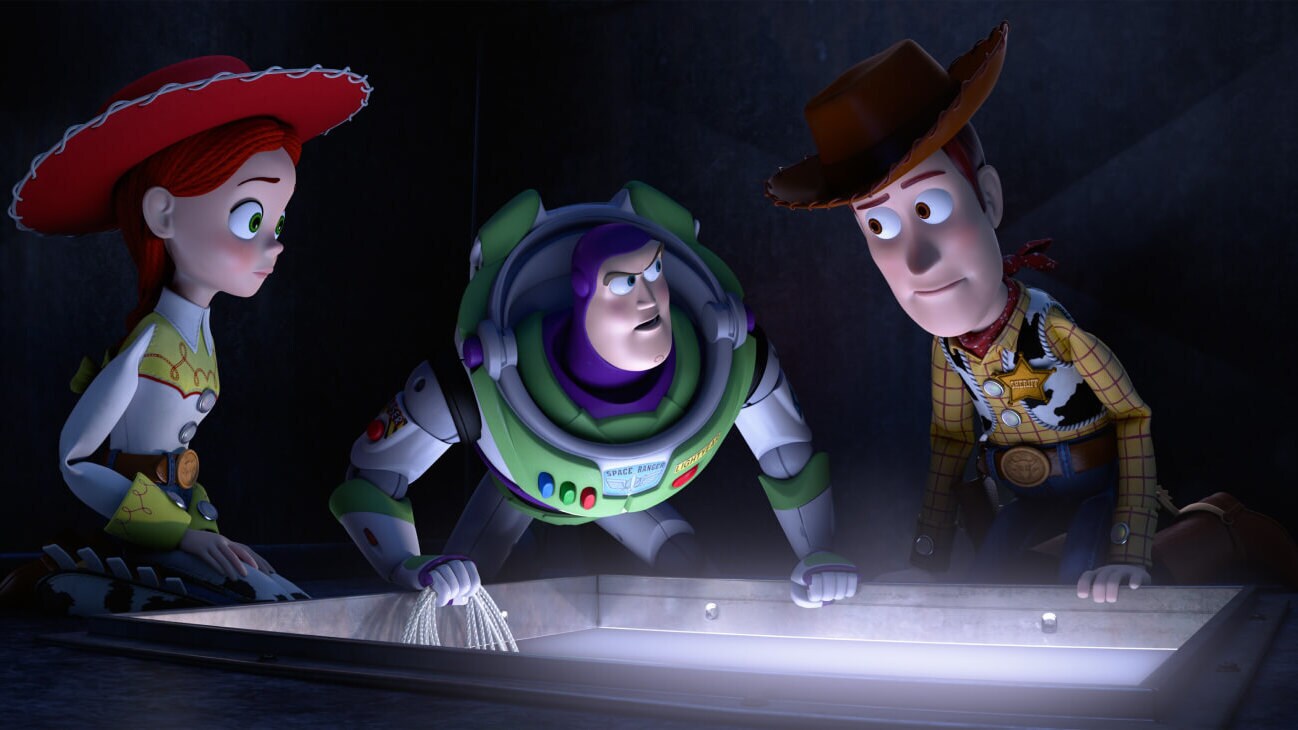 (L- R) Jessie (Joan Cusack), Buzz Lightyear (Tim Allen), and Sheriff Woody (Tom Hanks) formulate a plan to exit the vents in Toy Story of Terror! (2013).