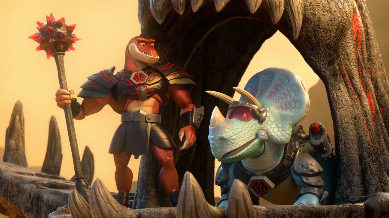 Reptillus Maximus (Kevin McKidd) explains the importance of battle to Trixie (Kristen Schaal) atop his Volcano Command Base in Toy Story That Time Forgot (2014).