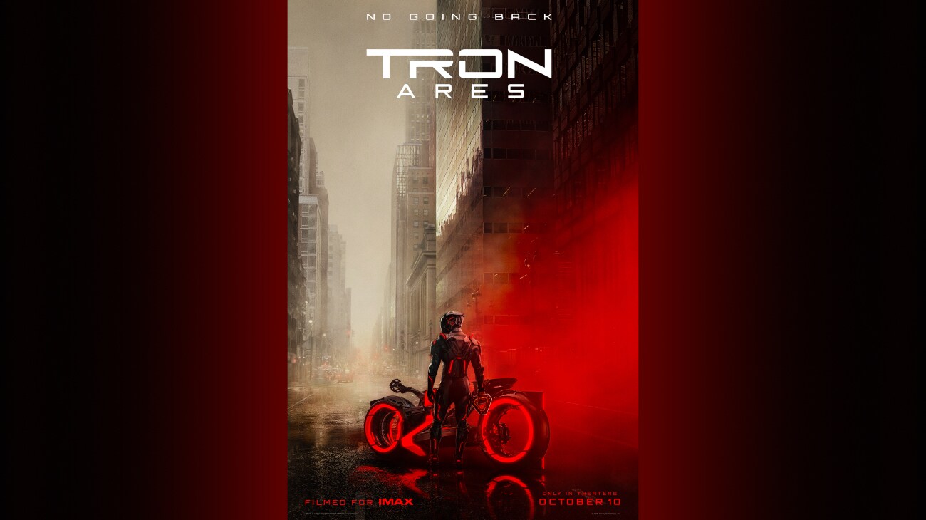 Image of an individual standing next to a light cycle on a city street from the movie, "Tron: Ares." | No going back | Tron: Ares | Filmed for IMAX | Only in theaters October 10 | movie poster
