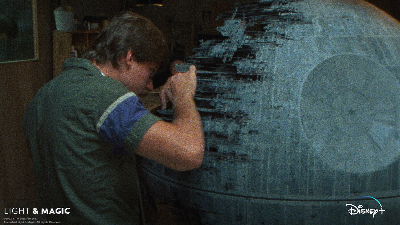 Image of a person working on the second Death Star model from the Disney+ Original series, "Light & Magic". | © & ™ Lucasfilm Ltd. ©Industrial Light & Magic. All Rights Reserved.