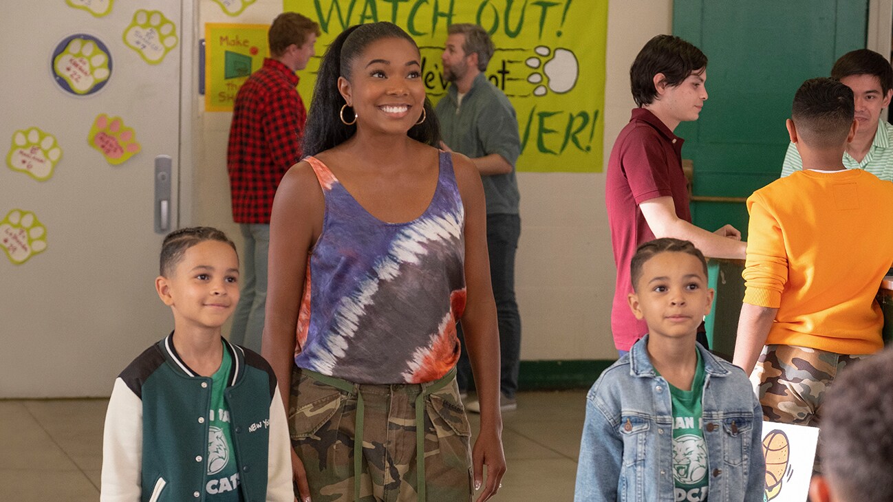 Gabrielle Union and the twins, Christian and Sebastian Cote, in the Disney+ Original movie "Cheaper by the Dozen".