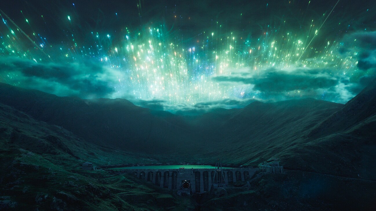 Image of a night sky lit up with bright lights from the Disney+ Original series, "Andor."