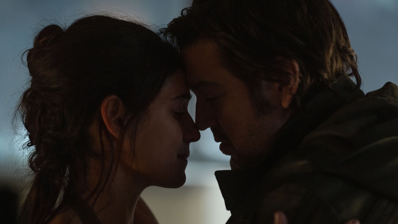 (L-R) Bix Caleen (Adria Arjona) and Andor (Diego Luna) in Lucasfilm's ANDOR Season 2, exclusively on Disney+. ©2024 Lucasfilm Ltd. & TM. All Rights Reserved.