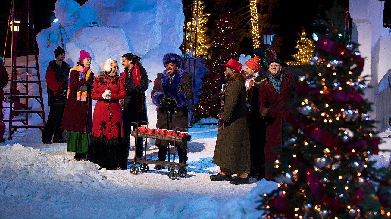 BEST IN SNOW. Host Titus Burgess (center) and D'Cappella. (Disney/Todd Wawrychuk)
