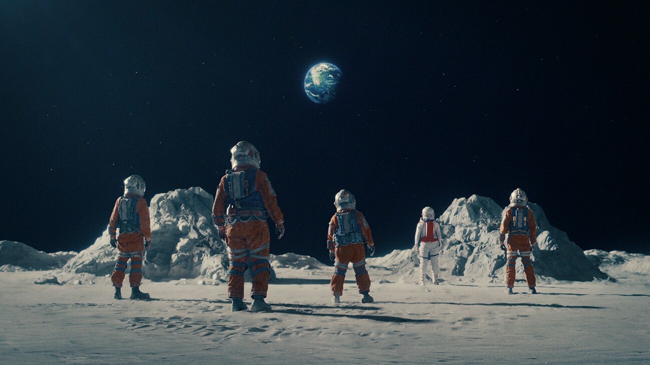 A scene still of several astronauts on a lunar surface from CRATER, exclusively on Disney+. Photo courtesy of Disney. © 2023 Disney Enterprises, Inc. All Rights Reserved.