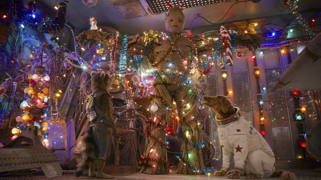 (L-R): Rocket (voiced by Bradley Cooper), Groot (voiced by Vin Diesel), and Cosmo (voiced by Maria Bakalova) in Marvel Studios' The Guardians of the Galaxy: Holiday Special, exclusively on Disney+. Photo by Jessica Miglio. © 2022 MARVEL.