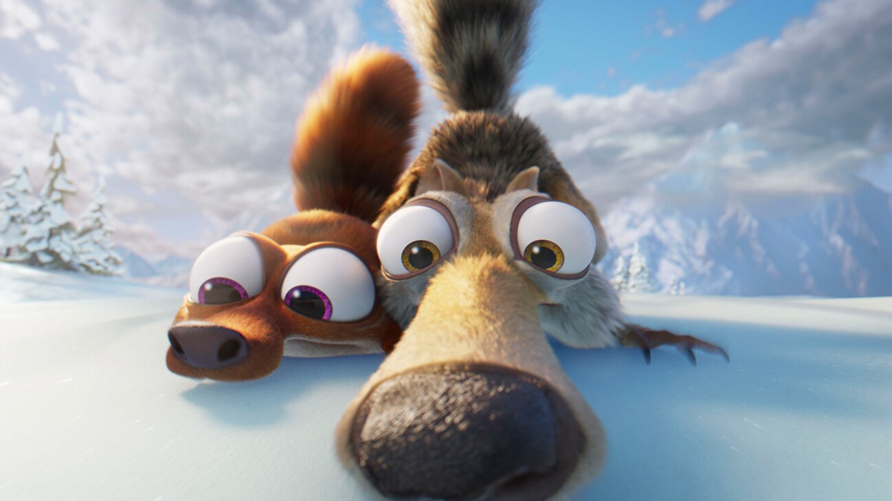 Scrat and Baby Scrat catch a scent on the ground.