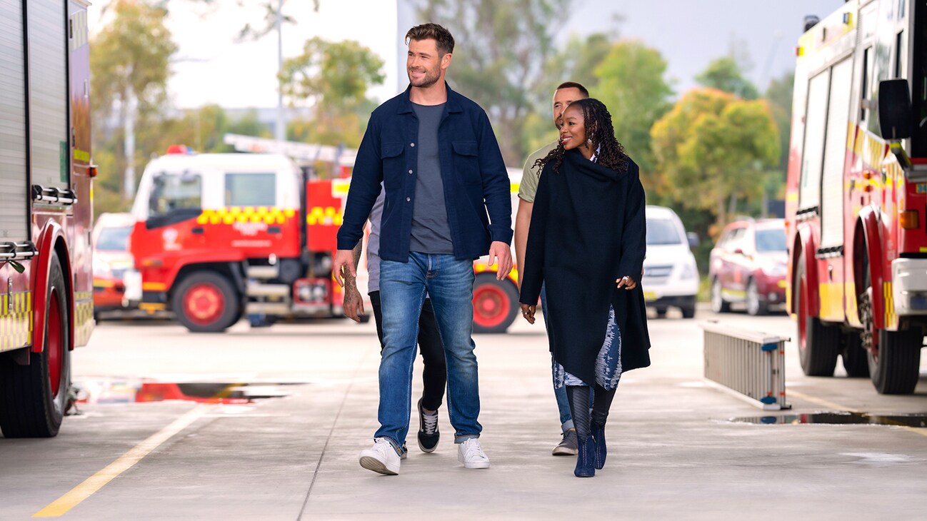Chris Hemsworth and Dr. Modupe Akinola arrive at NSW Fire and Rescue Training Academy to take part in the most stressful tests recruits face. (National Geographic for Disney+/Craig Parry)