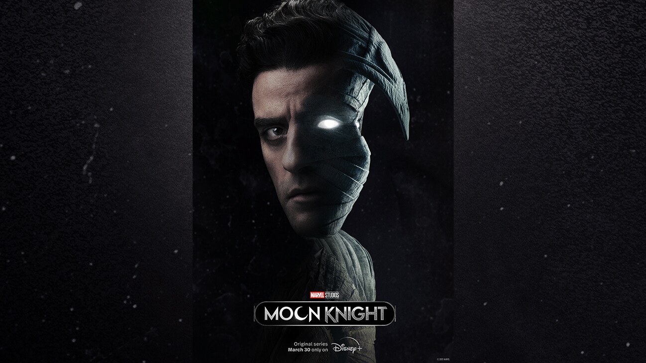 Image of face with one half featuring Steven Grant (actor Oscar Issac) and the other half featuring Mr. Knight from the Marvel Studios series "Moon Knight". Original series March 30 only on Disney+.