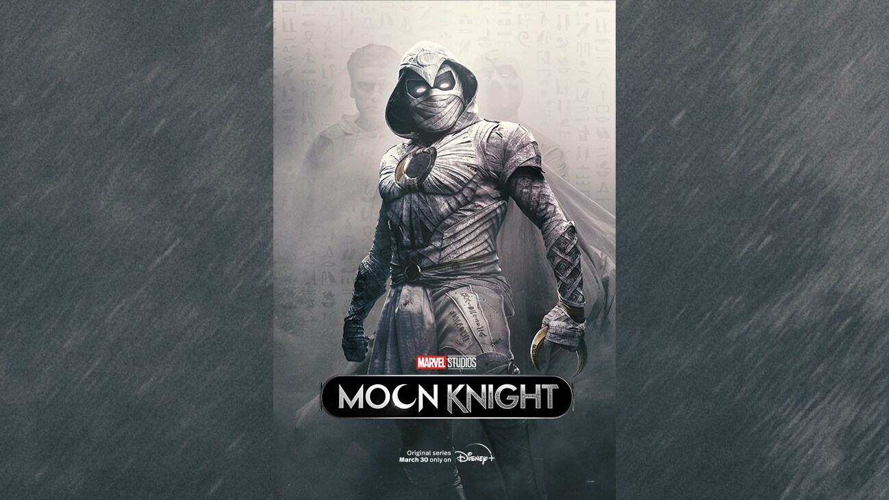 Image of a hooded character holding a small crescent moon with images of Mr. Knight and Steven Grant (actor Oscar Issac) barely visible in the background from the Marvel Studios series "Moon Knight". Original series March 30 only on Disney+.