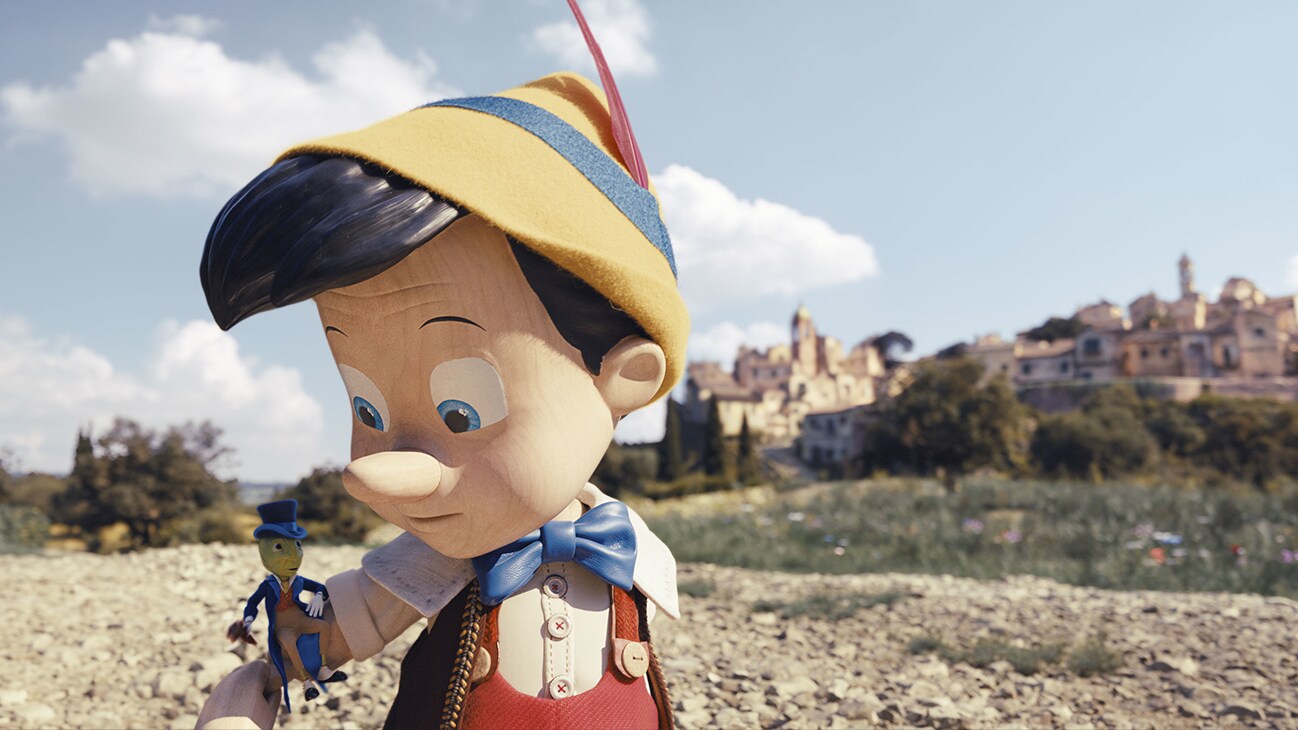(L-R): Jiminy Cricket (voiced by Joseph Gordon-Levitt) and Pinocchio (voiced by Benjamin Evan Ainsworth) in Disney's live-action PINOCCHIO, exclusively on Disney+. Photo courtesy of Disney Enterprises, Inc. © 2022 Disney Enterprises, Inc. All Rights Reserved.