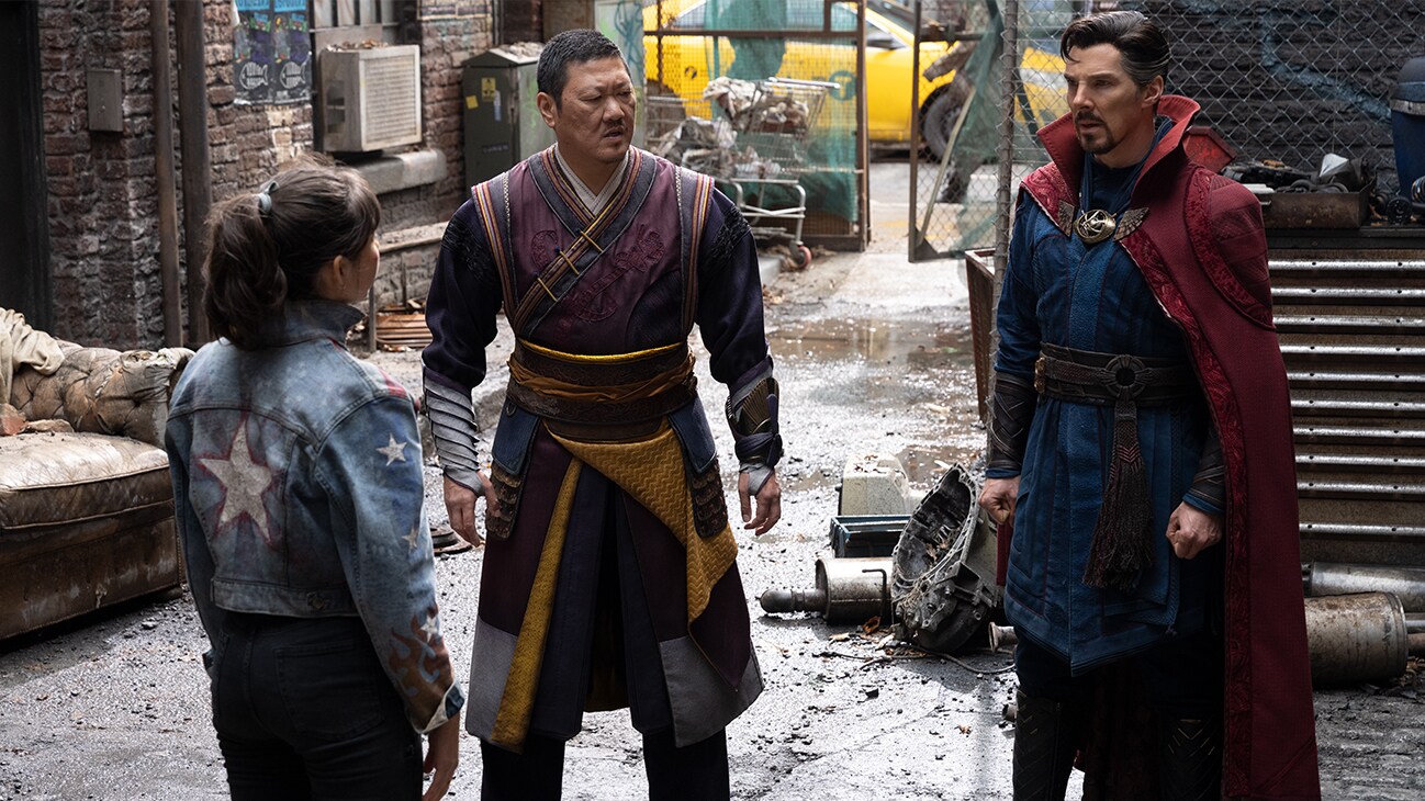 Doctor Strange (actor Benedict Cumberbatch), Wong (actor Benedict Wong) and America Chavez (actor Zochitl Gomez) from Marvel Studios' Doctor Strange in the Multiverse of Madness.