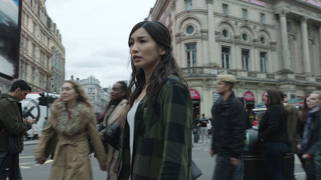 Sersi (actor Gemma Chan) in a street from the Marvel Studios movie Eternals.