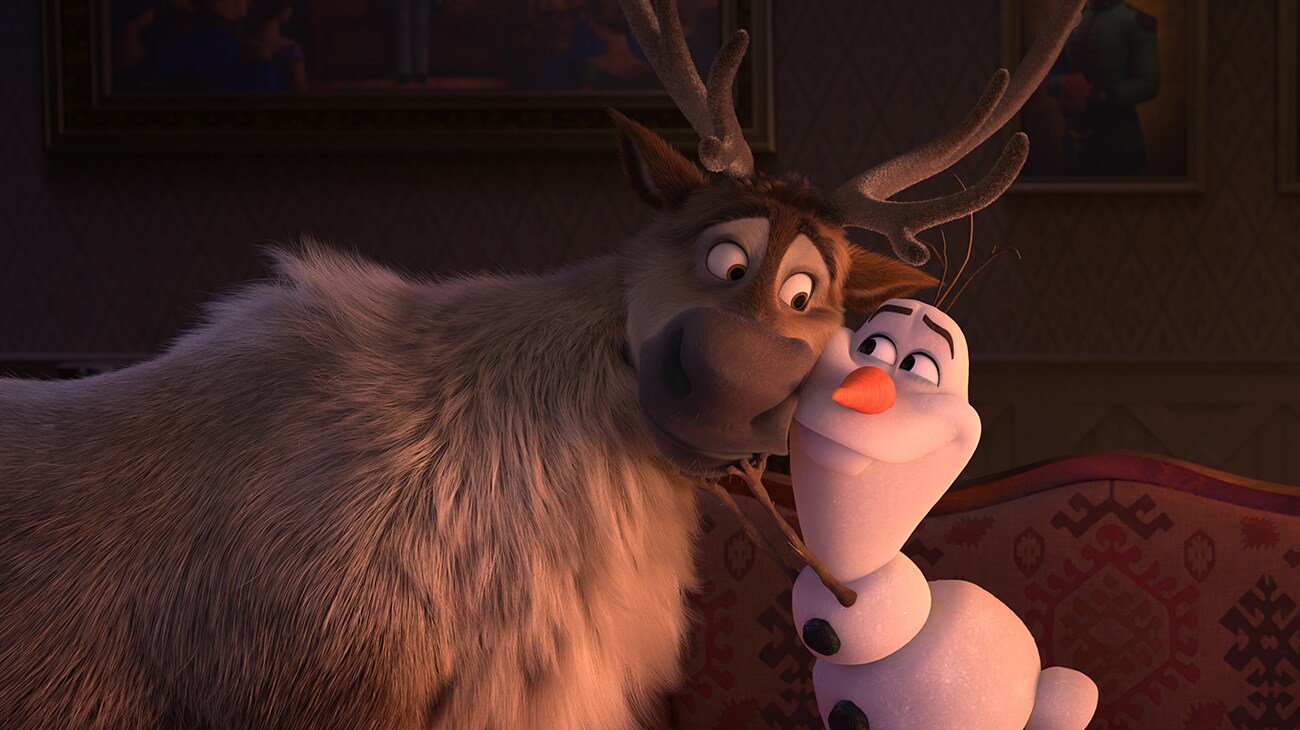 Olaf, voiced by Josh Gad, hugging Sven the reindeer in Frozen 2