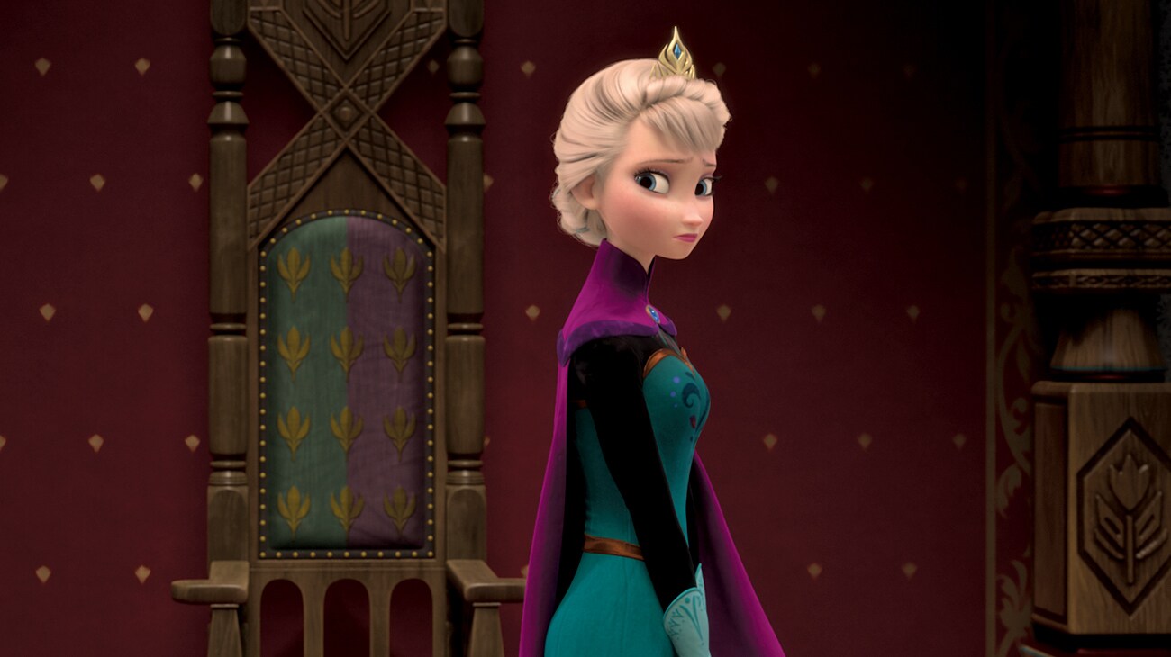 Elsa (voiced by Idina Menzel) in her crown, looking sad, in Frozen