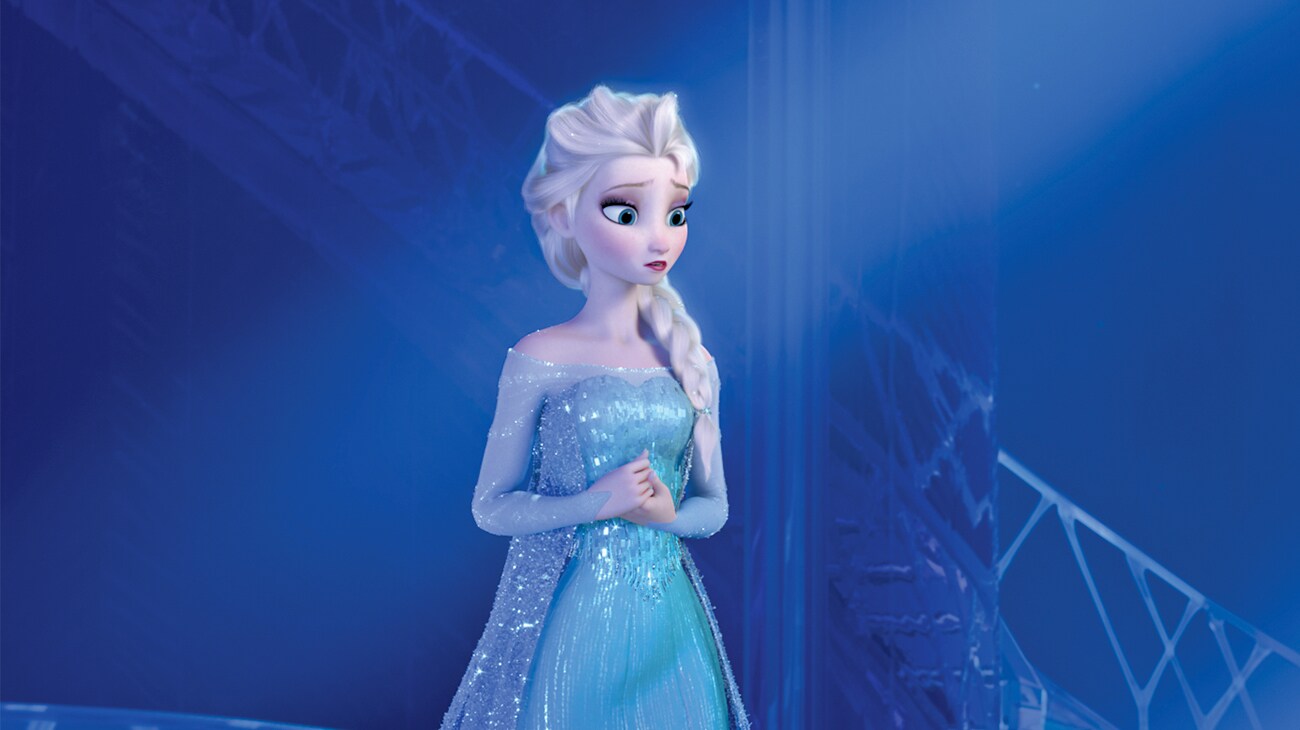 Elsa (voiced by Idina Menzel) in her blue dress in Frozen
