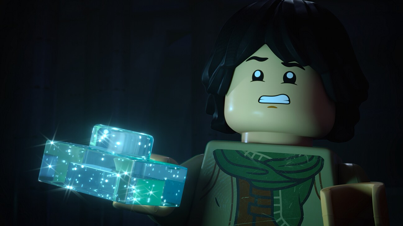 Sig Greebling holds the Cornerstone in a scene from LEGO® STAR WARS: REBUILD THE GALAXY, exclusively on Disney+. ©2024 Lucasfilm Ltd. & TM. All Rights Reserved.