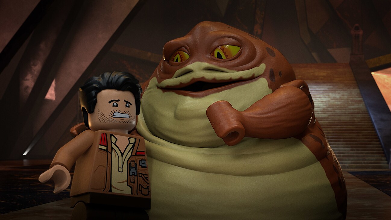 (L-R): Poe Dameron and Graballa the Hutt in LEGO STAR WARS TERRIFYING TALES exclusively on Disney+. ©2021 Lucasfilm Ltd. & TM. All Rights Reserved.