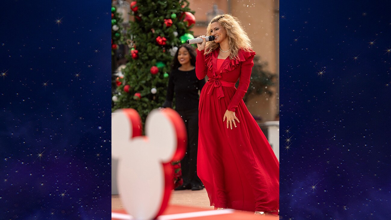 Tori Kelly performs with the Florida A&M University Choir at EPCOT at Walt Disney World Resort in Lake Buena Vista, Fla. on Saturday, Dec. 5, 2020, during a taping of “The Disney Parks Magical Christmas Celebration.” The holiday special will air on ABC on Dec. 25, 10am-12pm ET. (Kent Phillips, photographer)