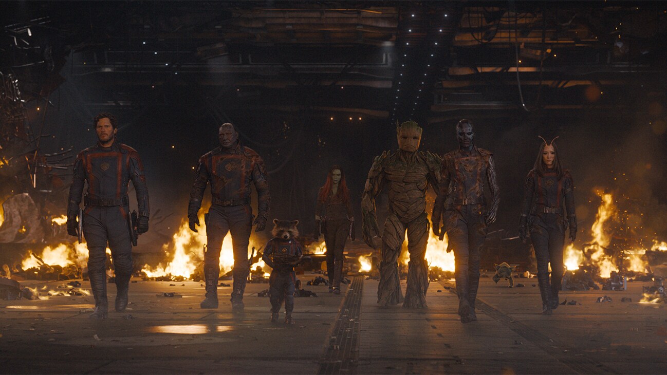 (L-R): Chris Pratt as Peter Quill/Star-Lord, Dave Bautista as Drax, Rocket (voiced by Bradley Cooper), Zoe Saldana as Gamora, Groot (voiced by Vin Diesel), Karen Gillan as Nebula, and Pom Klementieff as Mantis in Marvel Studios' Guardians of the Galaxy Vol. 3. Photo courtesy of Marvel Studios. © 2023 MARVEL.	