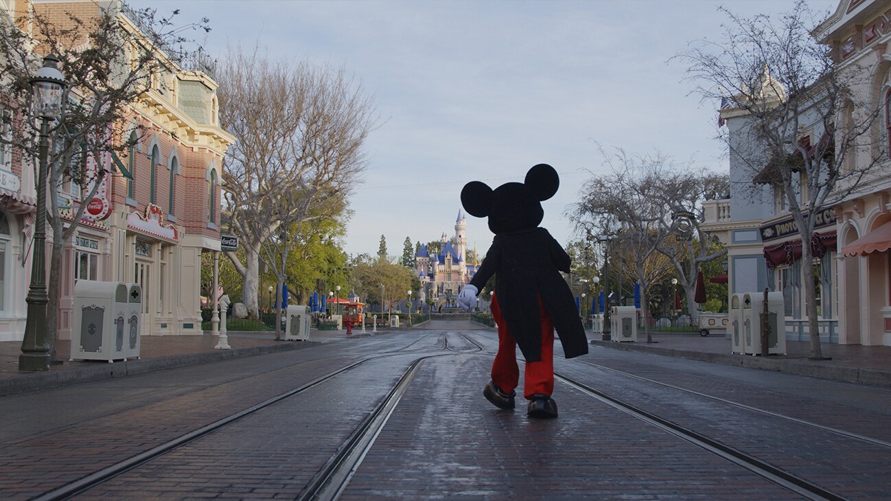 Mickey walks down Main Street USA at Disneyland. (Credit: Mortimer Productions)