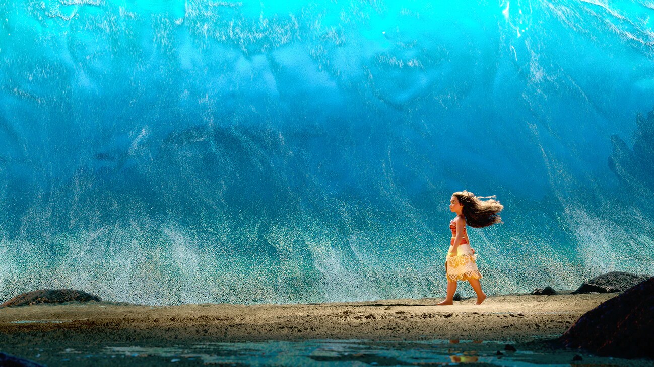 Moana walking through the ocean.