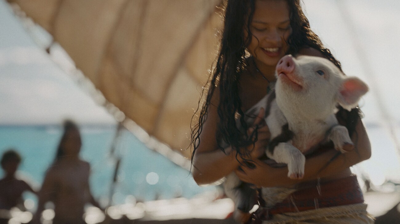 (L-R) Catherine Laga'aia as Moana and Pua in Disney's live-action MOANA. Photo courtesy of Disney. © 2026 Disney Enterprises, Inc. All Rights Reserved.