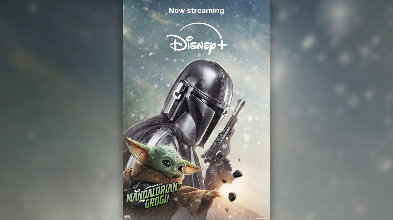 Image of The Mandalorian holding a blaster with Grogu by his side. Grogu is reaching forward towards a small object. | Now streaming | Disney+ | Star Wars: The Mandalorian and Grogu | Rated PG-13 | movie poster