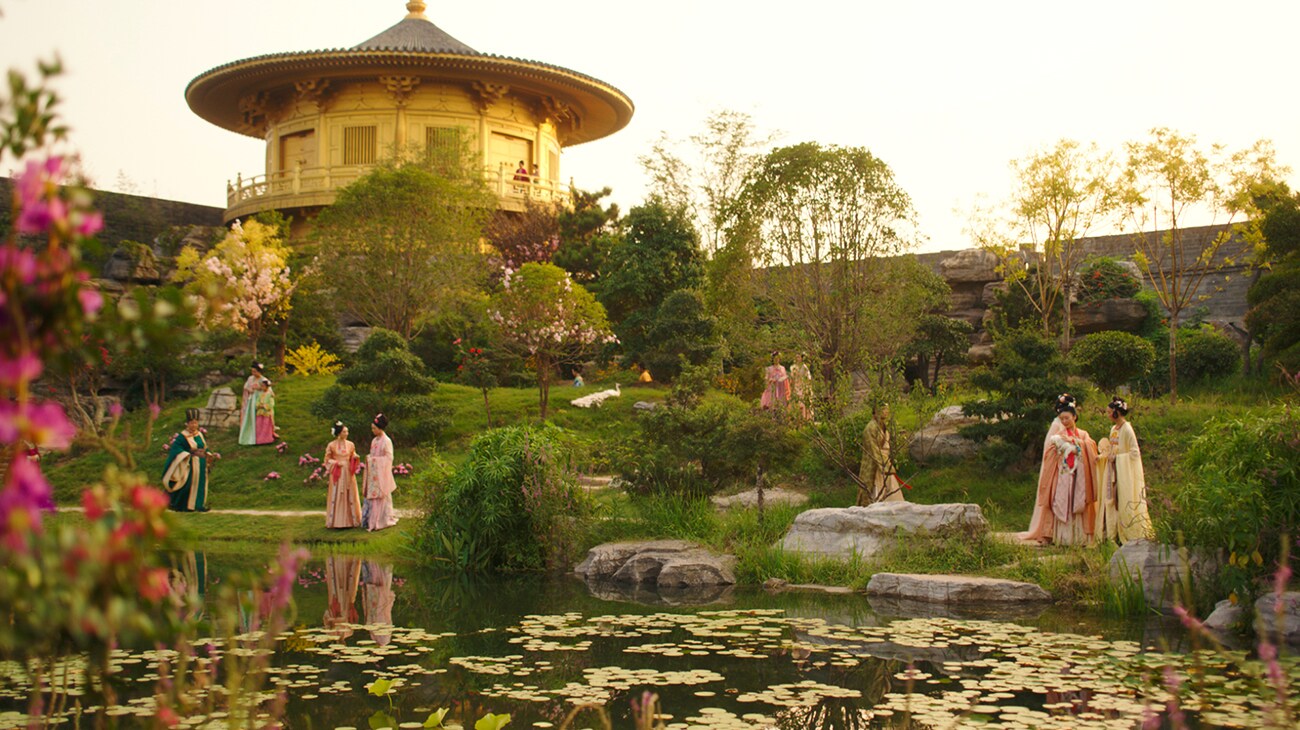 Women strolling in a garden in "Mulan"