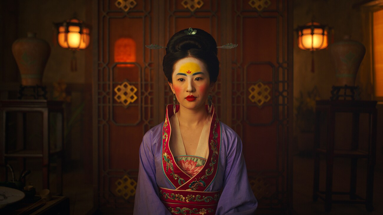 Yifei Liu (Mulan) dressed in formal attire in "Mulan"